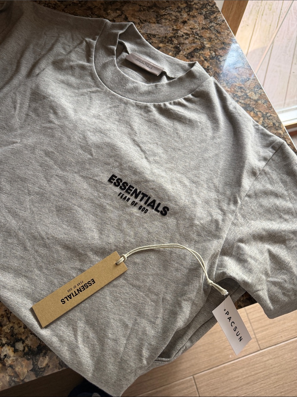 ESSENTIALS Men’s Light Gray Crewneck Tee with Black Logo